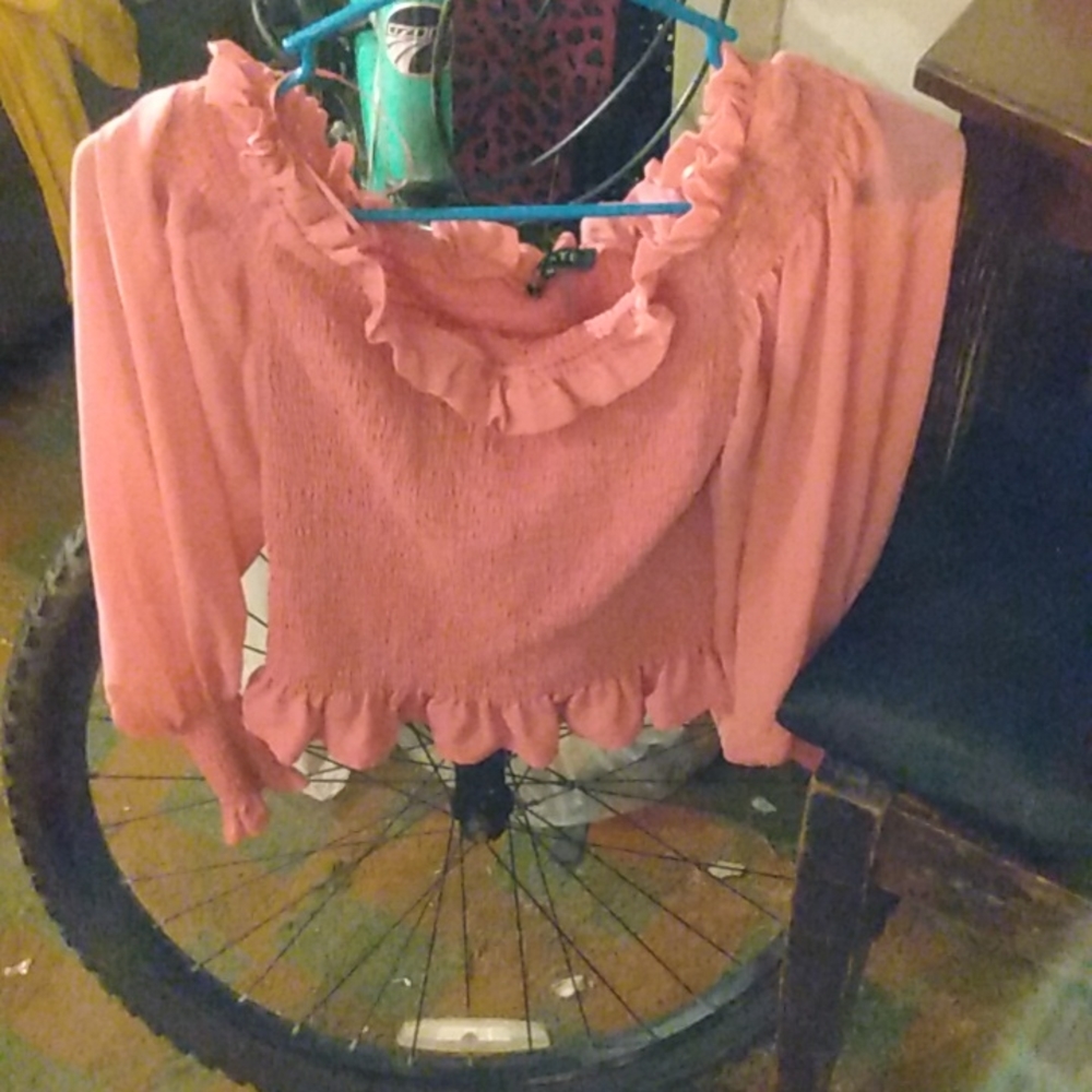 Salmon color ruffled at sleeves bottom and neck